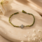 Handmade Lord Ganesha Green & Yellow Thread Raksha Bandhan Silver Rakhi