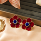 One-of-One 92.5 Silver Red Enamel Floral Stud Earrings with Blue Center