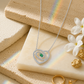 92.5 Silver Emerald-Hued Pear Cut Heart Swirl Pendant